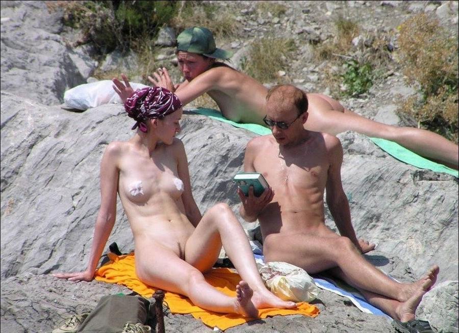 15P Hot Russian nudist strips her bikini off here