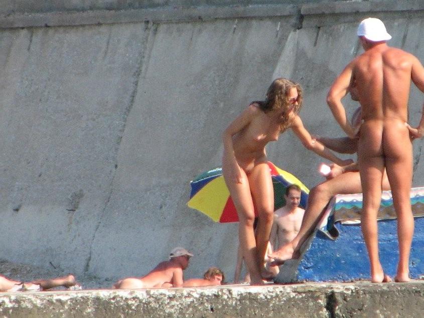 15P Brunette nudist teen strips down to tan her nude body