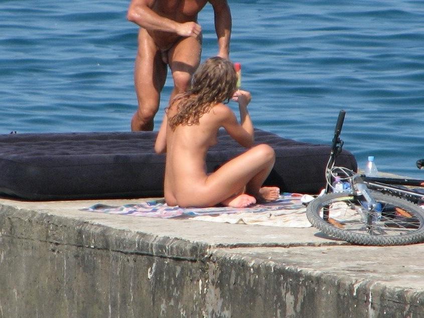 15P She enjoys the feel of warm water on her nude body