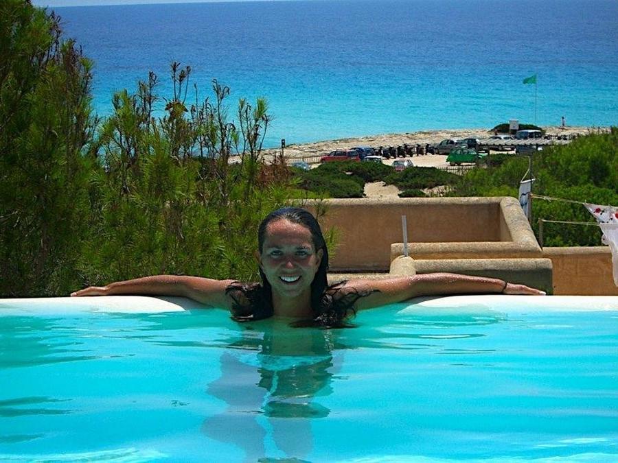 15P She enjoys the feel of warm water on her nude body