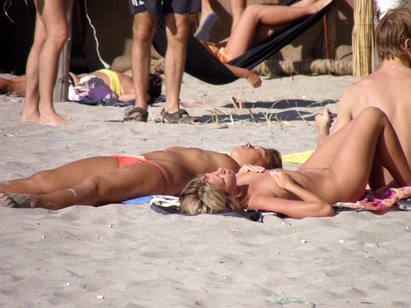 15P Naughty teen shows off her privates on the sand