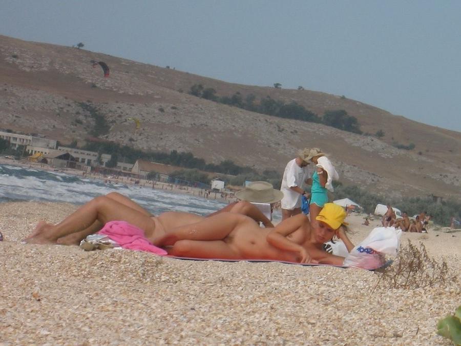 15P Naked teen nudist lets the water kiss her body