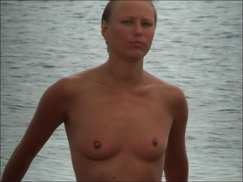 15P Naked lovers slyly filmed having sex fun in the sea