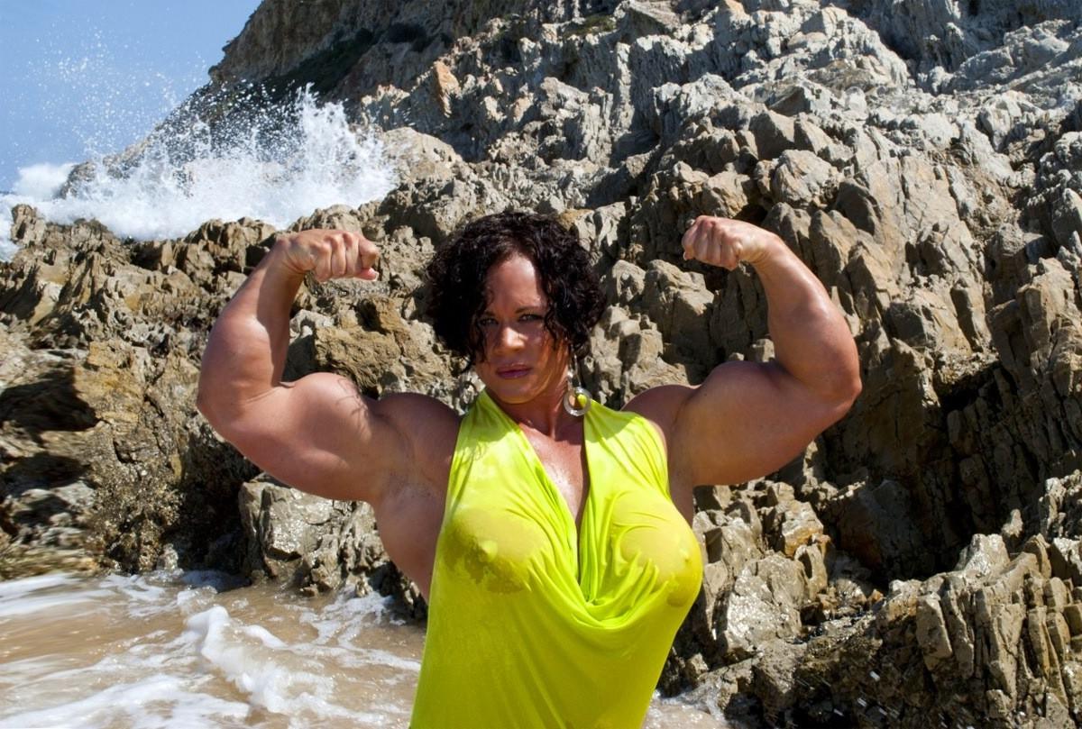 12P Massive female bodybuilder flexing her truly huge muscles