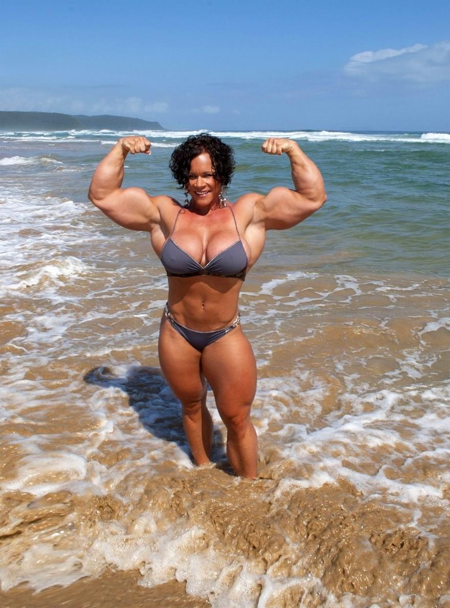 12P Massive female bodybuilder flexing her truly huge muscles