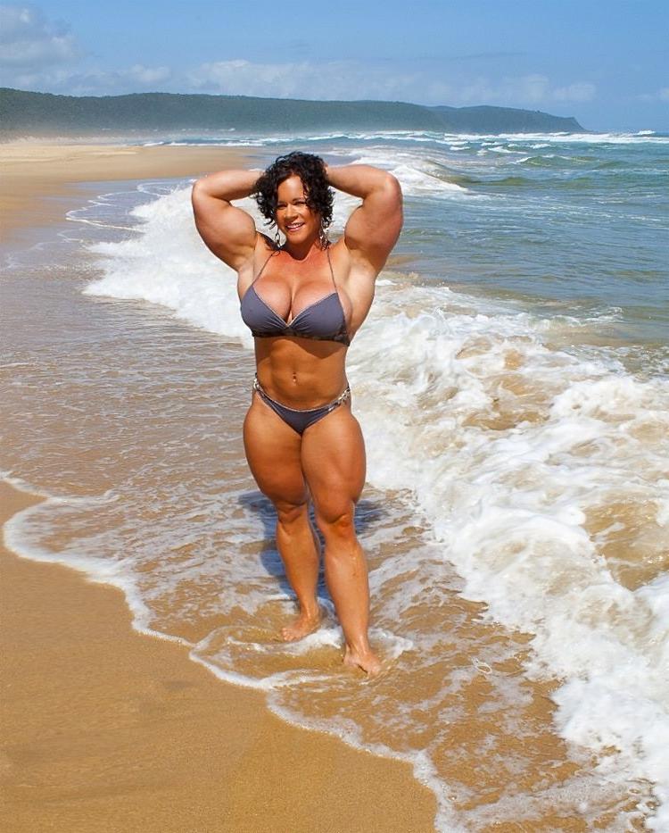 12P Massive female bodybuilder flexing her truly huge muscles