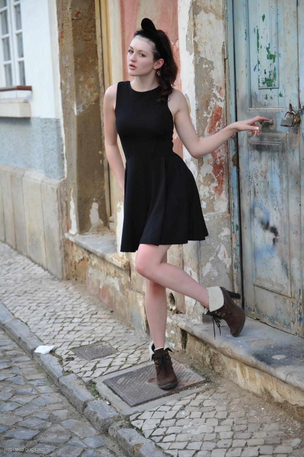 12P Beauty brunette Fawna strips out of her black dress