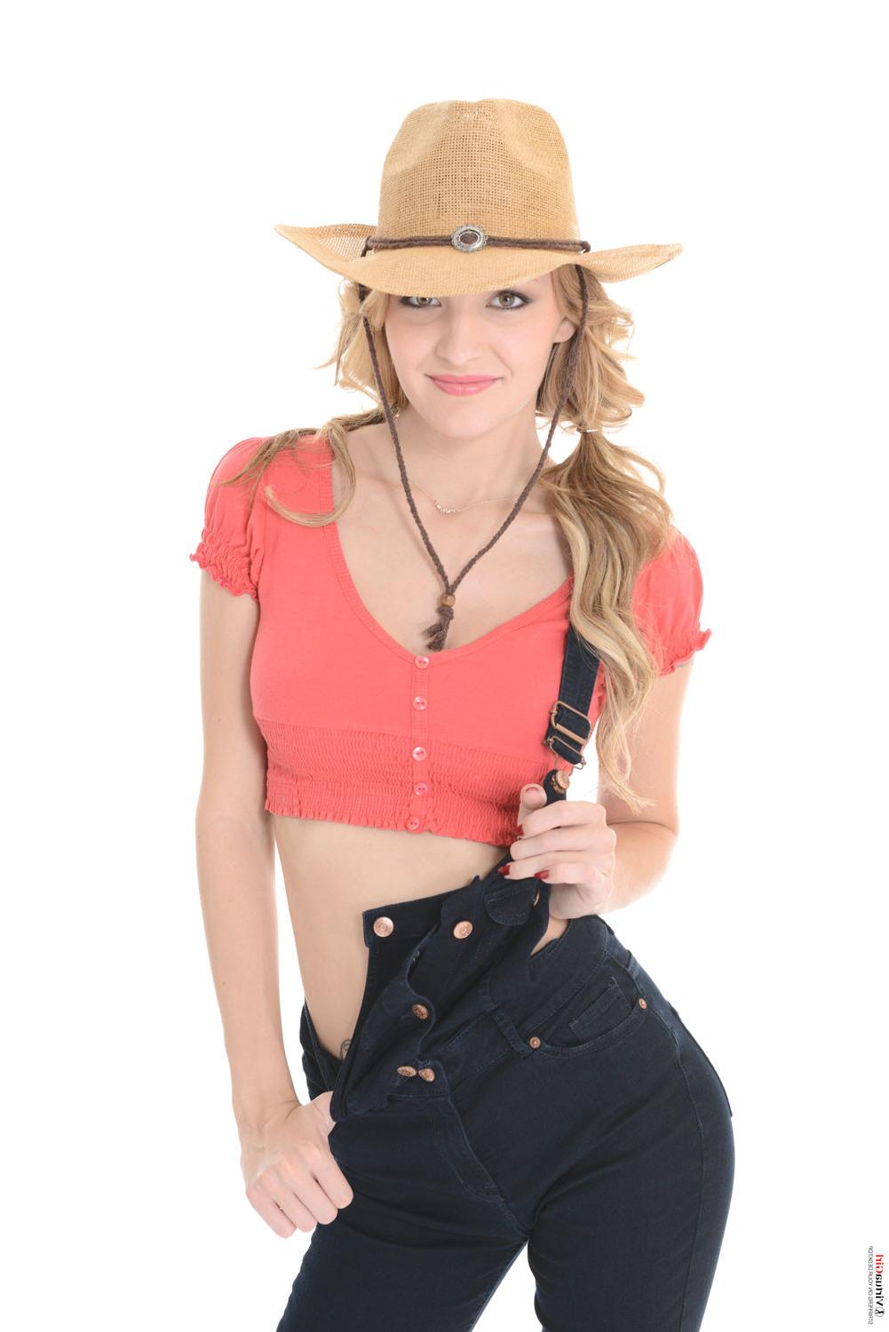 15P Cute blonde strips from her denim overalls and pink panties