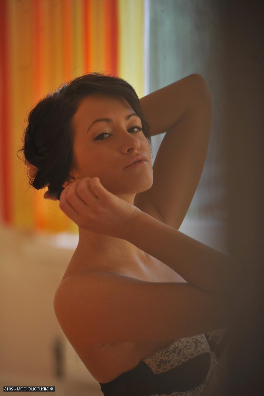12P Pretty brunette Tess Lyndon in her sexy bra and panties