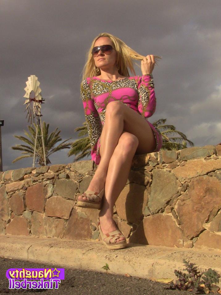 15P Naughty Tinkerbell gives her studded pussy plenty of hot sun posing on holiday