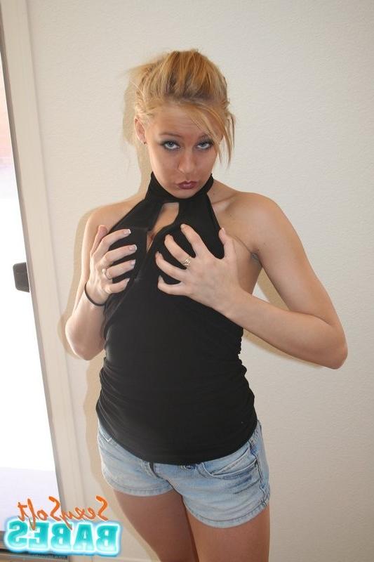 15P Danni Summers strips and licks her luscious melons