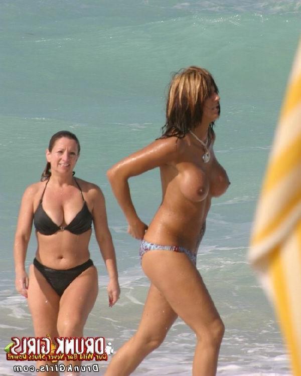 16P The beach looks that much nicer with these topless babes around
