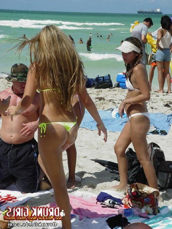 16P The beach looks that much nicer with these topless babes around