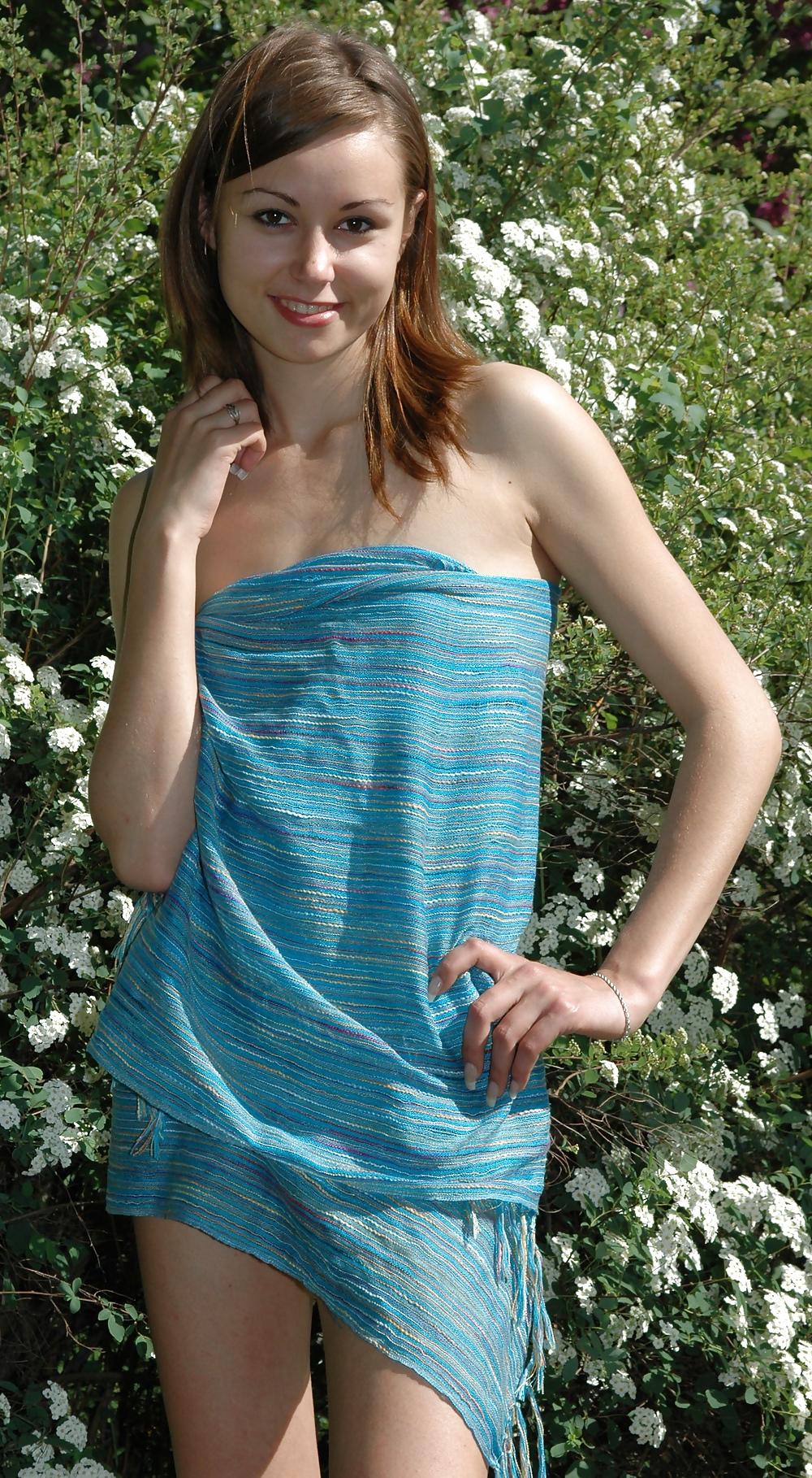 25P Cute teen Anfisa with tiny tits posing on the nature