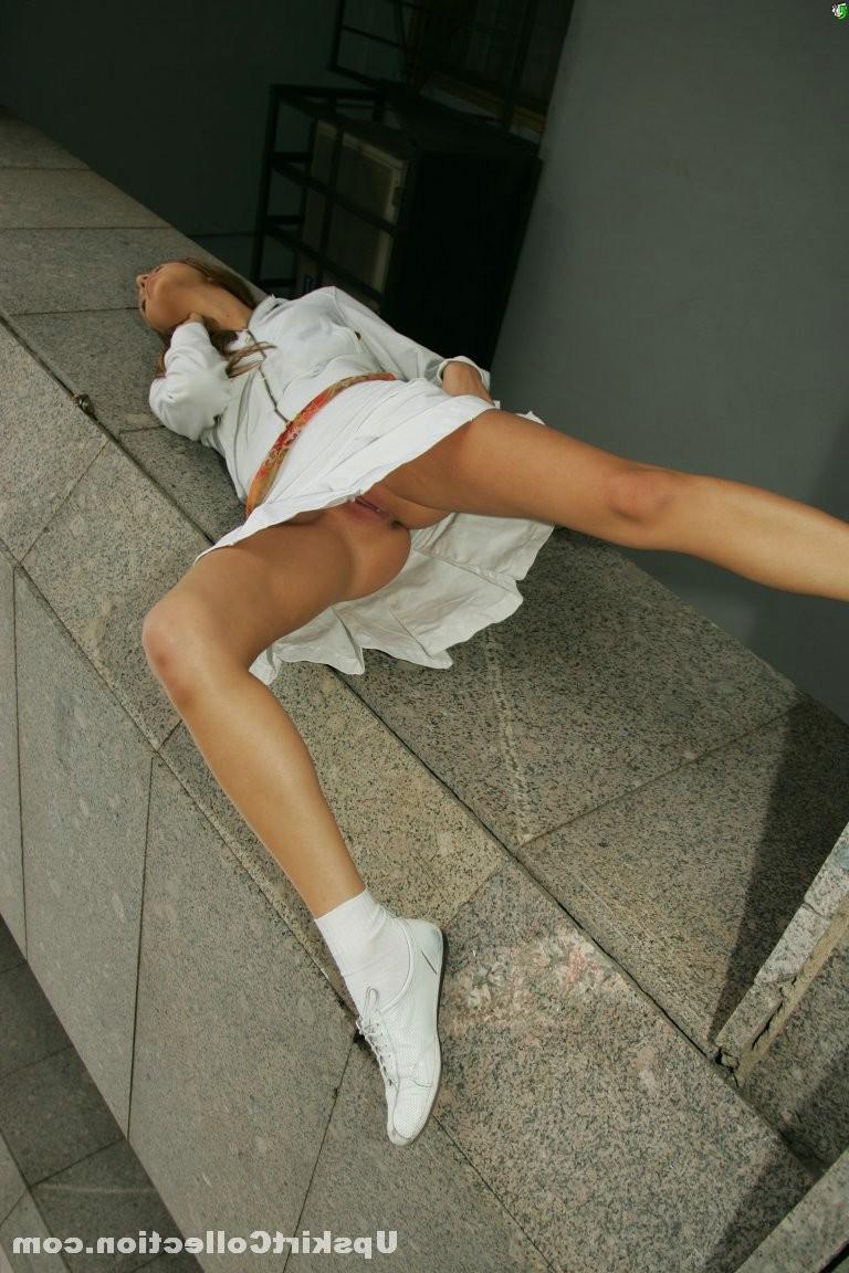 15P Very hard pics with saucy doll flashing naked pussy