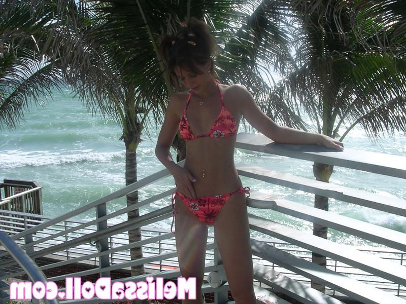 15P Melissa peels back her bikini and shows a pink plump pussy