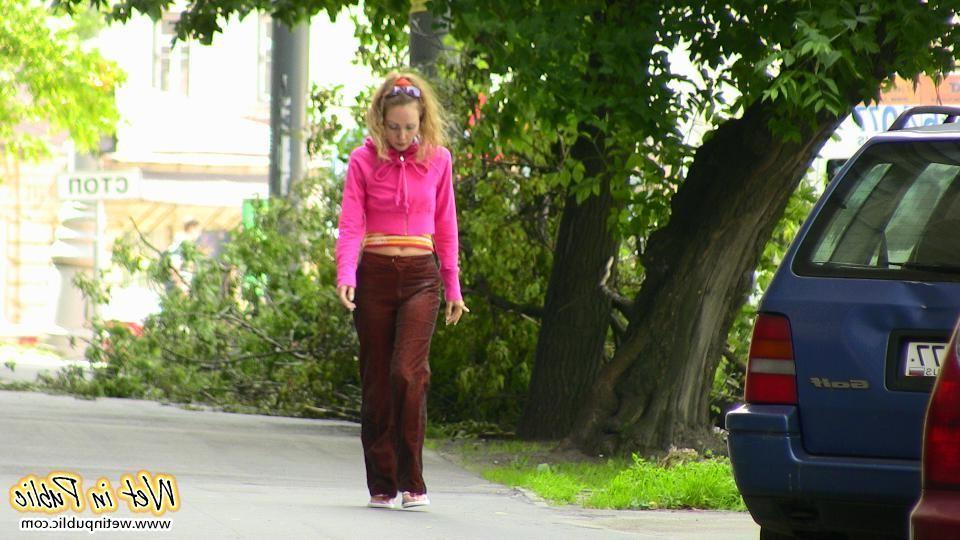 12P Nasty babe pee-soaks her sexy crimson pants behind a car in the yard