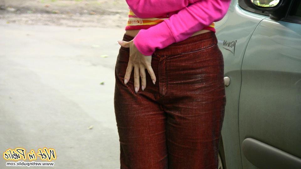 12P Nasty babe pee-soaks her sexy crimson pants behind a car in the yard