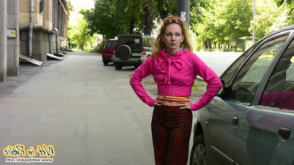 12P Nasty babe pee-soaks her sexy crimson pants behind a car in the yard