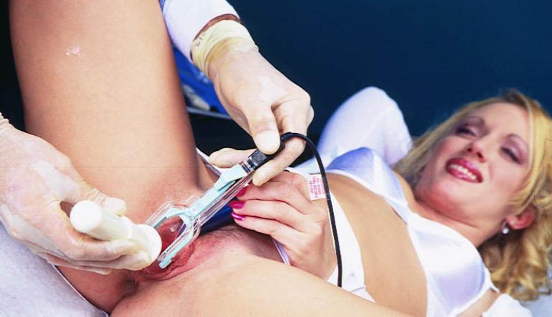 15P Wide spread blonde examined by doc