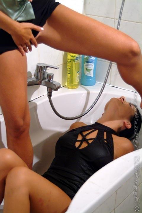 15P Two hot chicks getting pissed on