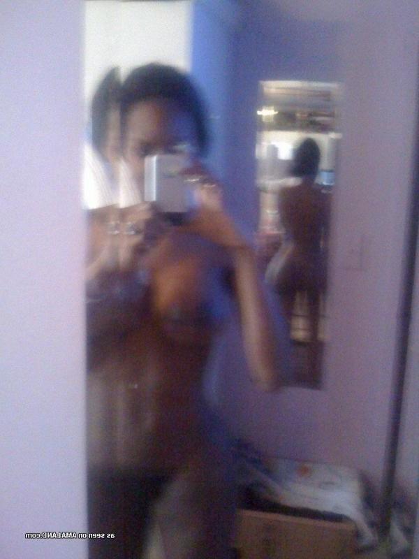 10P Naughty black bombshell with perfect round tits posing naked