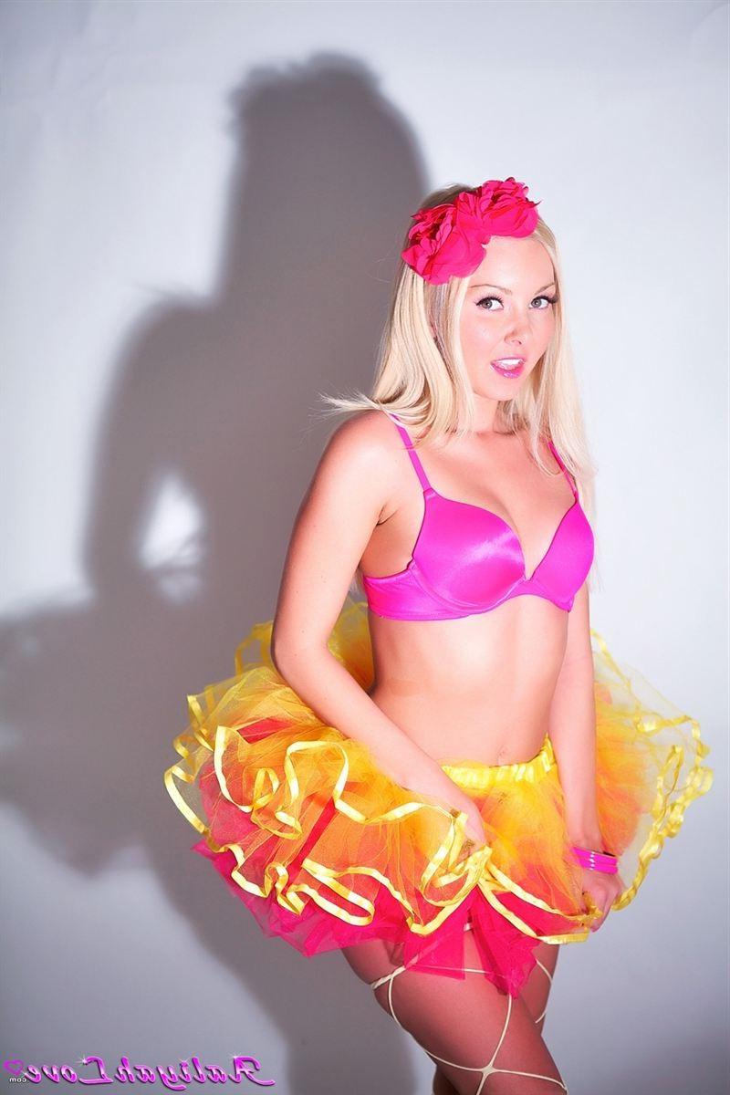16P Aaliyah Love shakes her tail in a pink and yellow tutu