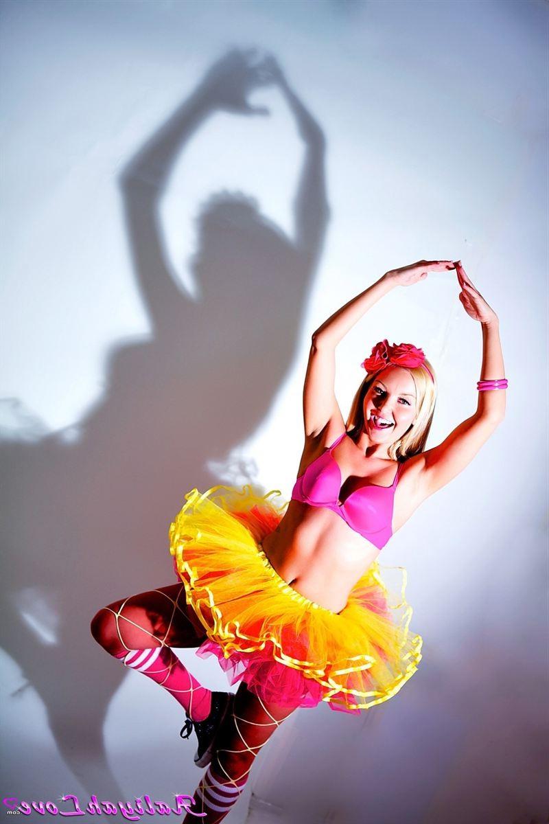 16P Aaliyah Love shakes her tail in a pink and yellow tutu