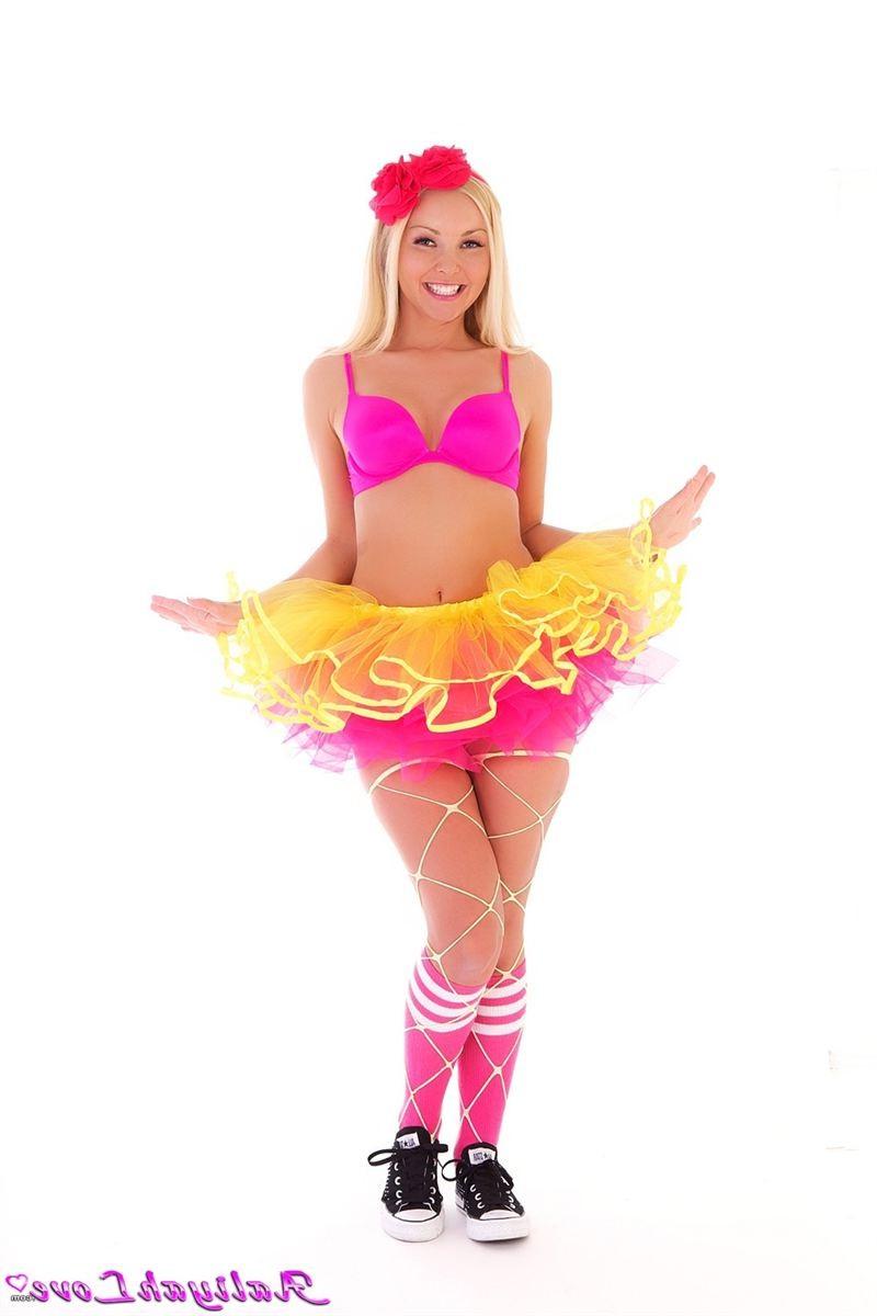 16P Aaliyah Love shakes her tail in a pink and yellow tutu