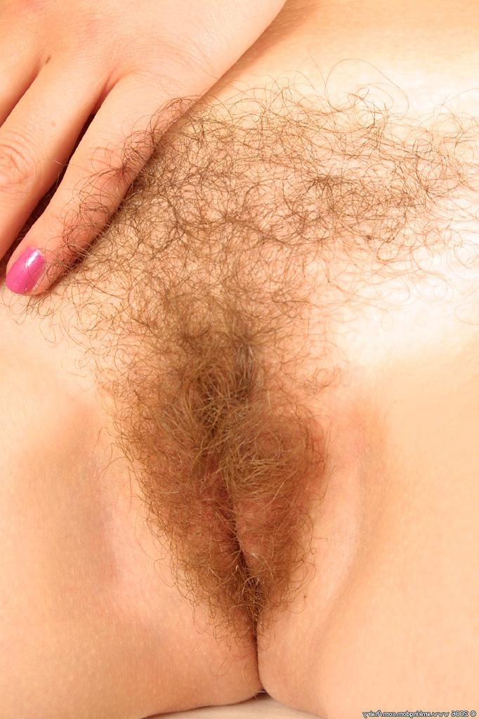 16P Nice smiling blonde girl with a hirsute pussy