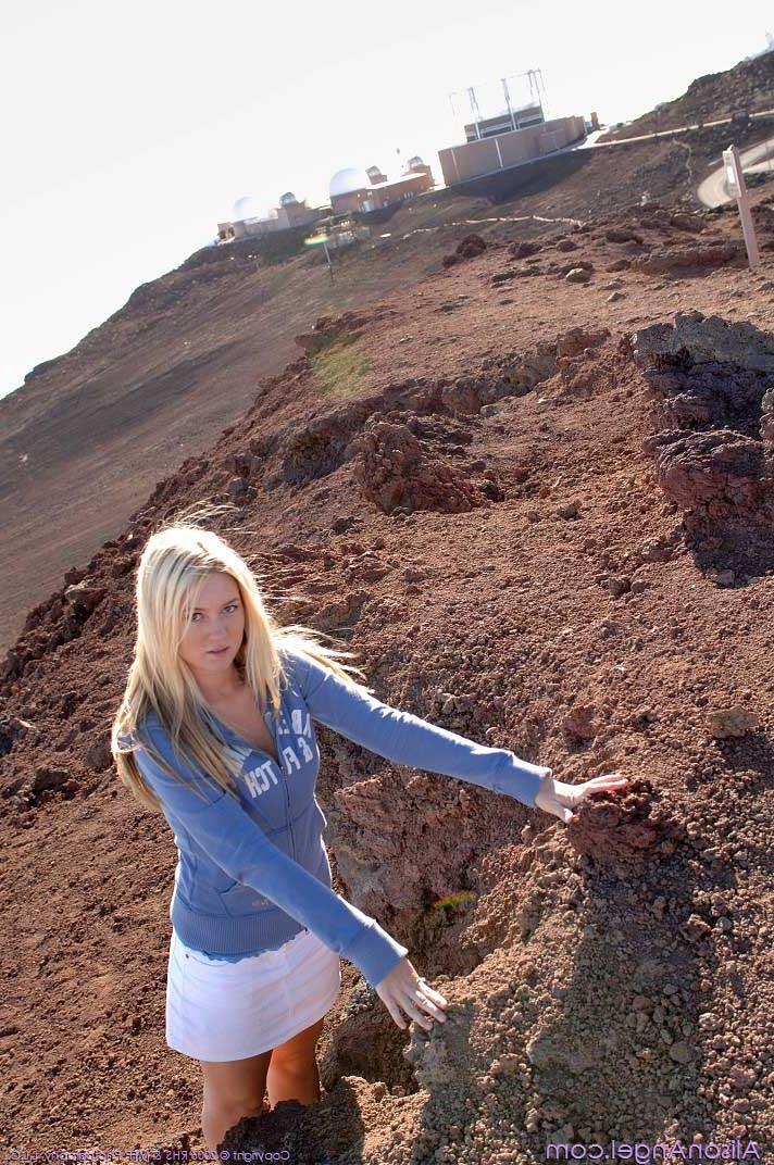 16P Busty blonde teen flashes big tits and sweet ass outdoors