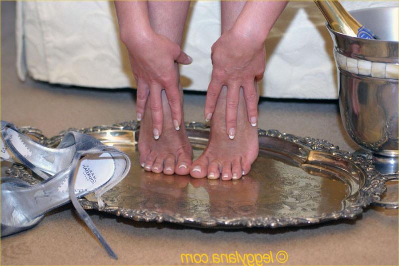 12P Barefoot blonde gets her feet soaked with champagne