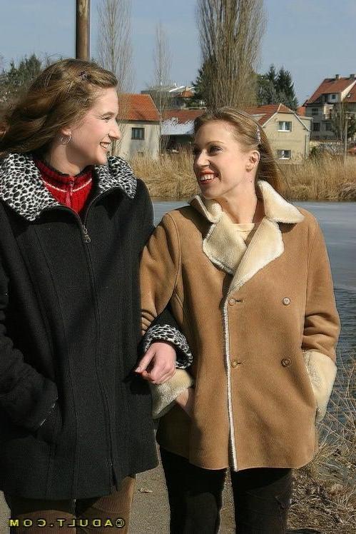 16P Three cute playful lesbians walking in the park