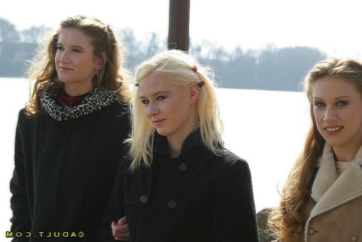 16P Three cute playful lesbians walking in the park