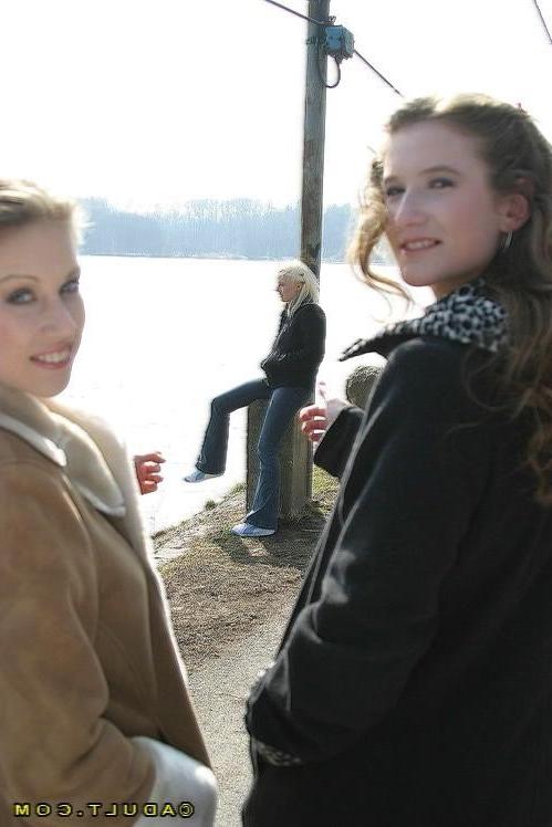 16P Three cute playful lesbians walking in the park