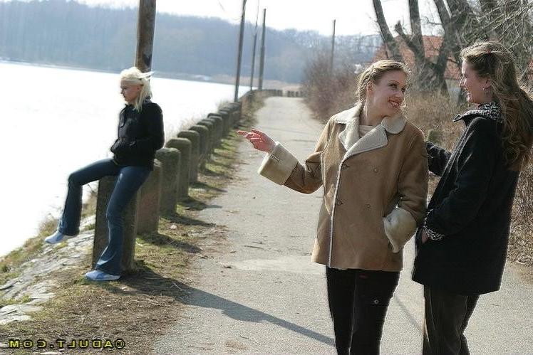16P Three cute playful lesbians walking in the park