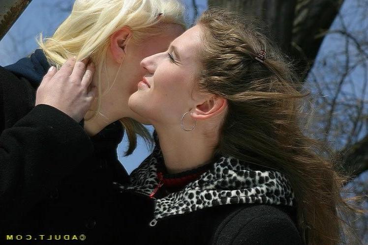 16P Three cute playful lesbians walking in the park