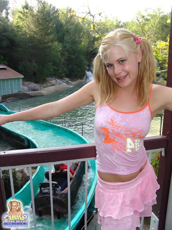 15P Blonde teen plays at the amusement park