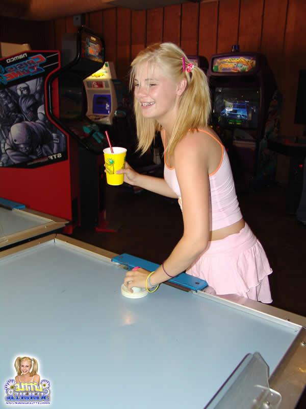 15P Blonde teen plays at the amusement park