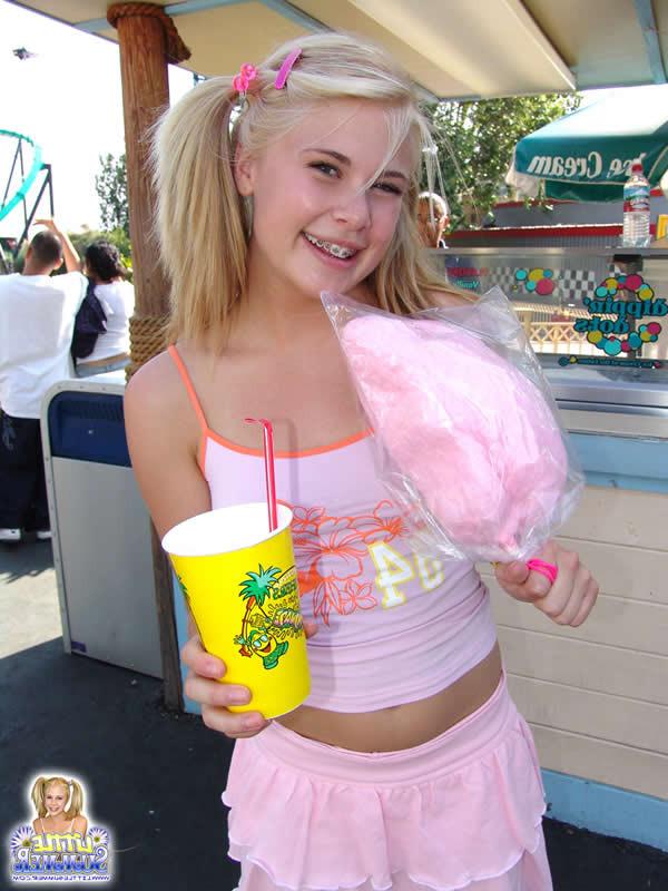 15P Blonde teen plays at the amusement park