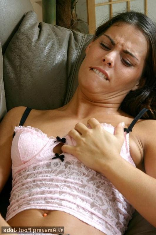 12P Lingerie wearing hottie gives a foot job