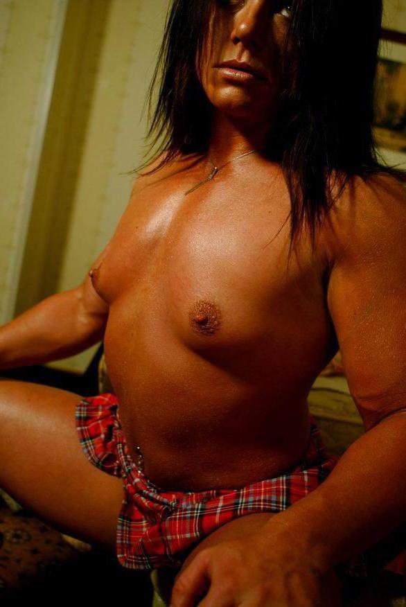 15P female bodybuilder shows off her muscles