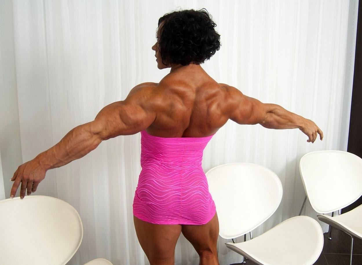 12P Massive female bodybuilder flexing her truly huge muscles