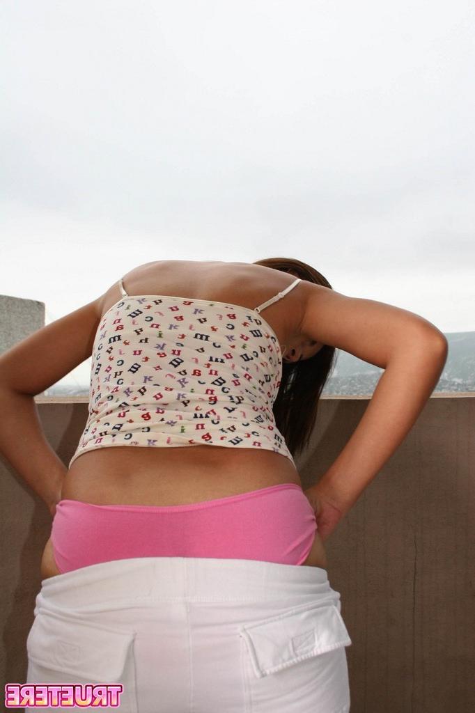 16P Teen girl teasing with panties outside