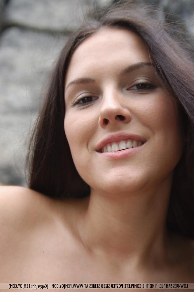 16P Busty brunette teen with great legs posing nude outdoors