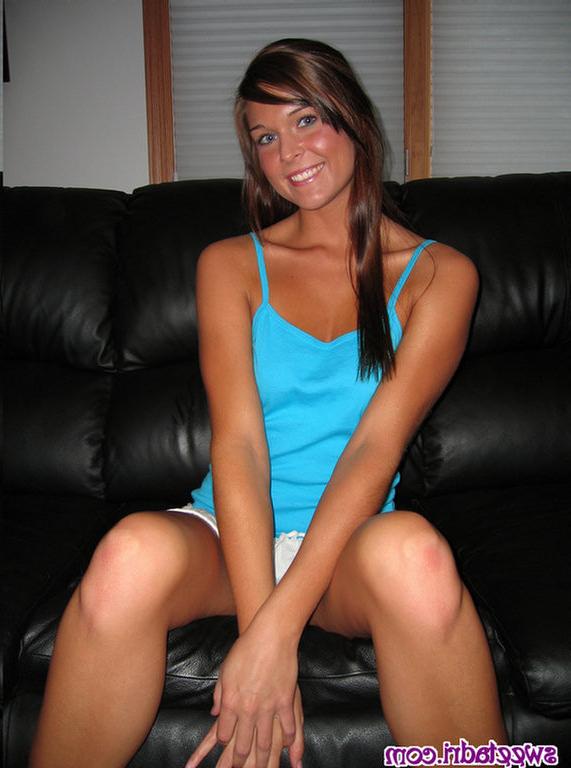 16P SweetAdri on the couch with a blue top and white skirt