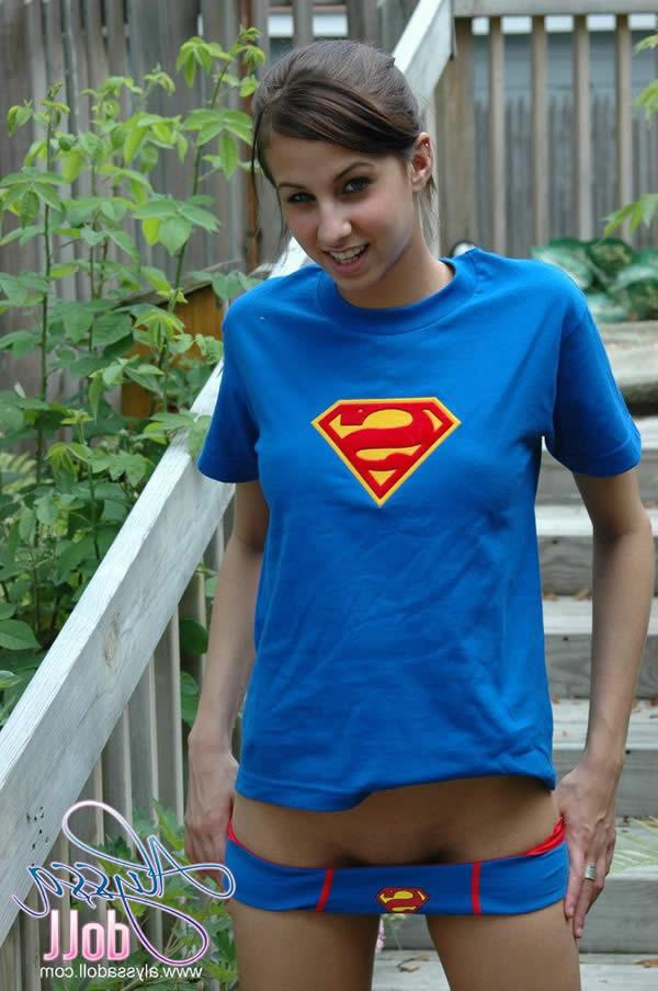 15P Brunette teen alyssa doll in superman panties flashes her tits
