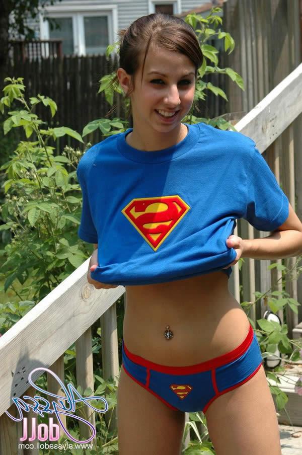 15P Brunette teen alyssa doll in superman panties flashes her tits