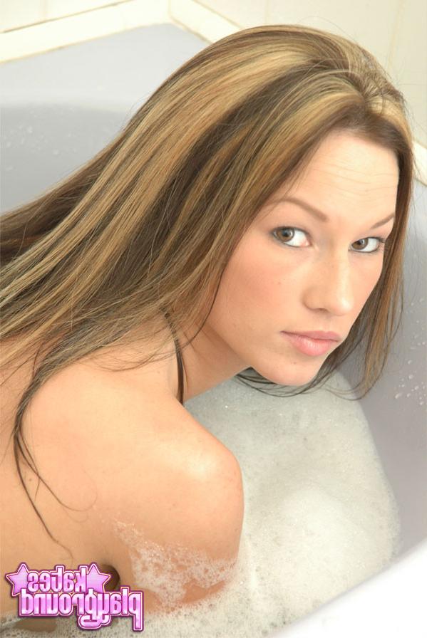 15P Naughty Kate with long hair taking a sensual bath