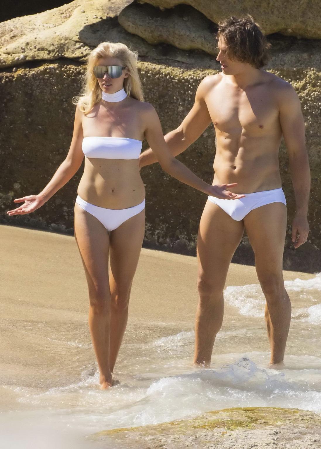 16P Lara Stone showing pokies and cameltoe in white bikini